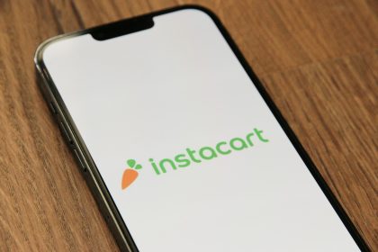 a phone with the instocart logo on it