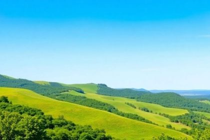 Scenic Alabama landscape with hills and clear sky.